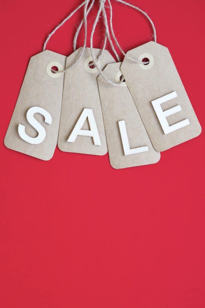 Price tags with a word sale on red background